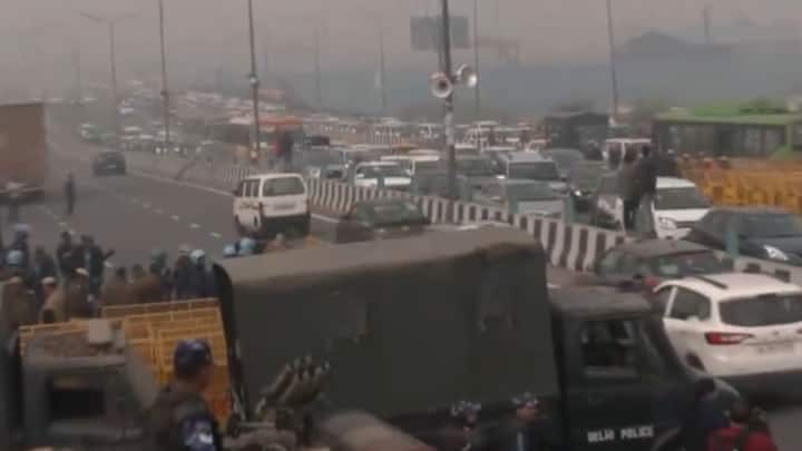 Commuters faced difficulty amid traffic restrictions at Delhi's Ghazipur border as well. (Source:ANI)