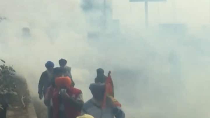 Police fired tear gas at the farmers gathered around Punjab-Haryana's Shambhu border. (Source: ANI)