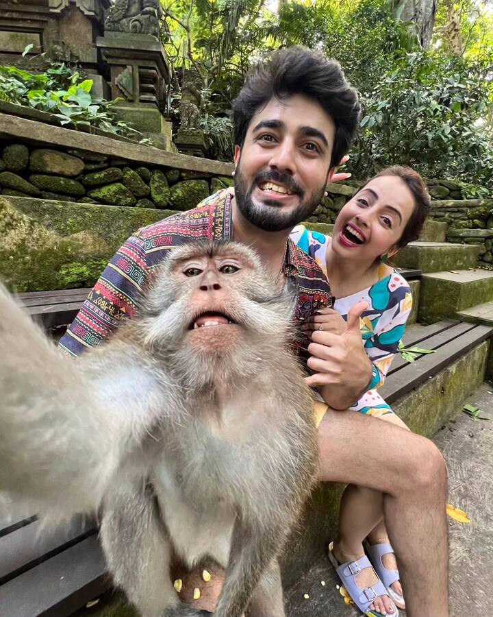 Shrenu Parikh and Akshay Mhatre: Newly married couple Shrenu Parikh and Akshay Mhatre shared a goofy picture posing with a monkey as their V-Day post. (All Image: Instagram.)