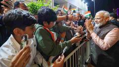 Photos: दोहा में बच्चे के सिर पर पीएम मोदी का हाथ, जब पहुंचे कतर तो ऐसे हुआ स्वागत