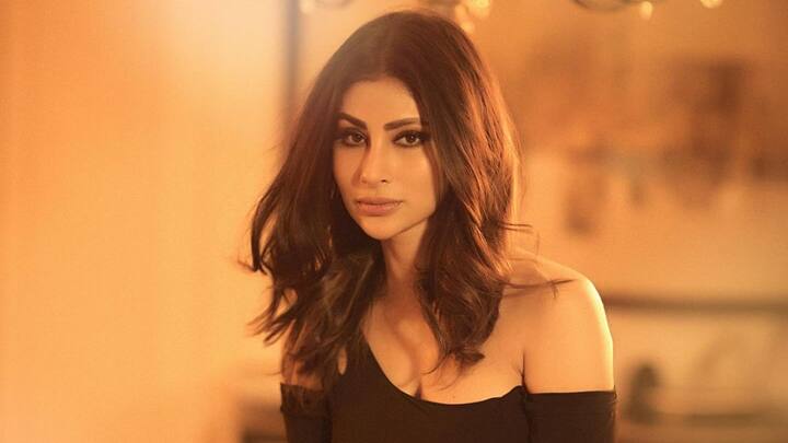 Mouni Roy treated fans with pictures in a black bodycon dress looking stunning as ever