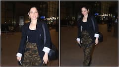 Tamanna: ఎయిర్‌పోర్టులో తళుక్కున మెరిసిన తమన్నా - ప్రియుడు ఎక్కడా?