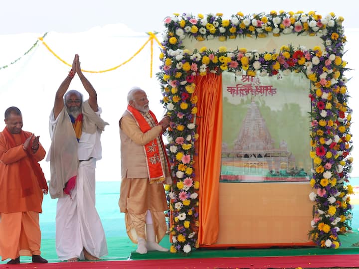 Prime Minister Narendra Modi unveils the model of the Shri Kalki Dham temple. (Photo: X/@narendramodi)