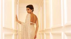 PHOTO: दीपिका पदुकोणचा ग्लॅम लूक; शिमरी साडीमध्ये पोहचली रेड कार्पेटवर!