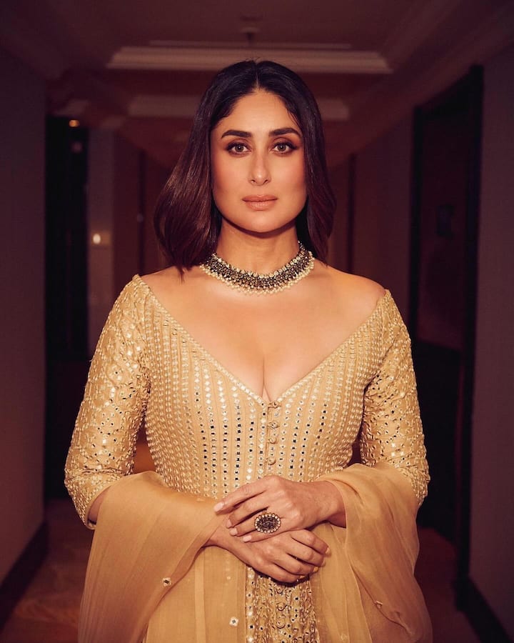 Kareena can be seen looking extremely gorgeous in the embellished lehenga featuring a blouse with a plunging neckline.