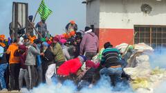 Farmers Protest: Security Beefed Up At Delhi-Haryana Borders, Tear Gas Fired As Protestors Resume March. In Pics