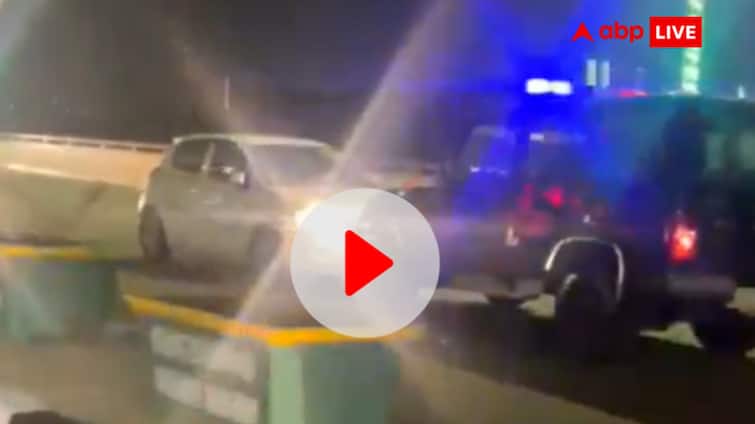Ghaziabad car upside started down elevated road moving video surfaced ann UP News: गाजियाबाद के एलिवेटेड रोड पर दिखा फिल्मी स्टंट, पुलिस को देख बैक गियर में 2KM तक दौड़ाई कार