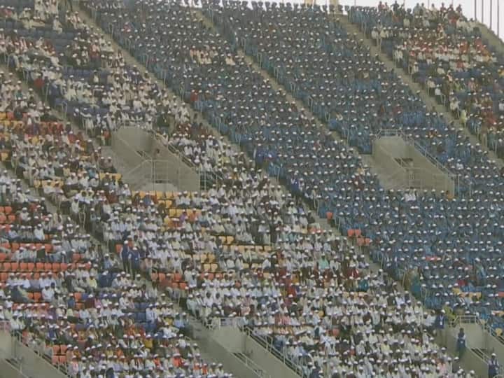More than 1.25 lakh dairy farmers, with representatives from around 18,600 villages in Gujarat, attend the programme at the Narendra Modi Stadium on Thursday. (Photo: X/@BJP4India)