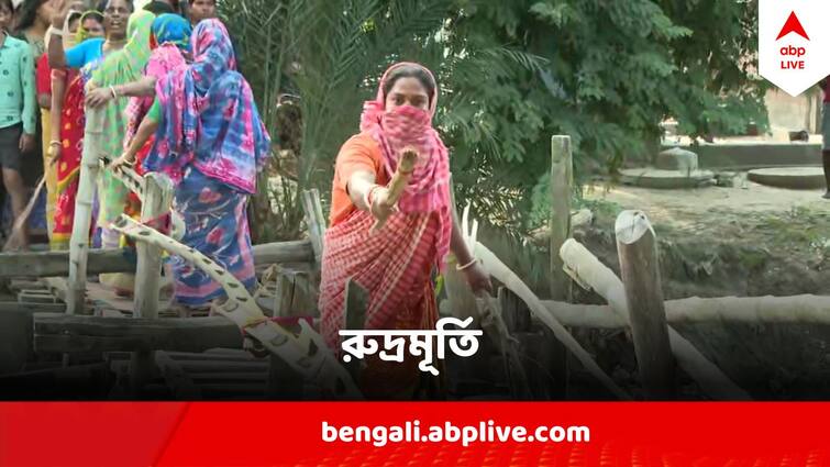 Sandeshkhali Chaos Women Protest With Lathi, Agitation of detaining  HS examinee Against Police Sandeshkhali Chaos : সন্দেশখালিতে আজও লাঠি হাতে রুদ্রমূর্তি মহিলাদের , পরীক্ষার্থীকে আটকের অভিযোগ পুলিশের বিরুদ্ধে