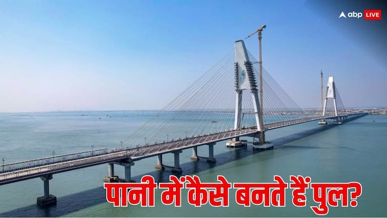 Narendra Modi inaugurates India longest cable stayed bridge Sudarshan Setu know how bridge are built in water पानी रोकना तो संभव नहीं है, फिर समुद्र के एक दम बीच में ये पुल बनाते कैसे हैं? ये होती है ट्रिक