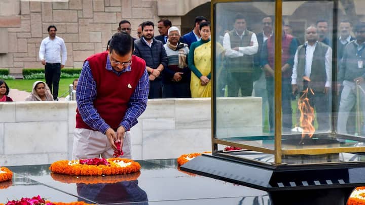 Delhi CM Arvind Kejriwal paid homage to Mahatma Gandhi at the Rajghat as he visited to mark one year of party leader Manish Sisodia's arrest, in New Delhi (image source: PTI)