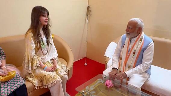 PM Modi Met German signer Cassandra Mae Spittmann |జర్మనీ సింగర్ నోట దేవుడి పాటలు,పరవశించిపోయిన మోదీ