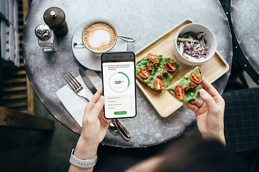 Before diving into a meal, take a moment to assess your hunger on a scale from 1 to 10, where 1 represents ravenous hunger, and 10 signifies feeling overly full. This simple practice allows you to gauge your body's actual needs, preventing overeating or undereating based on external cues. (Image Source: Getty)