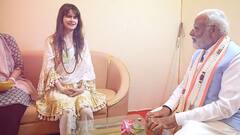 PM Modi Met German signer Cassandra Mae Spittmann |జర్మనీ సింగర్ నోట దేవుడి పాటలు.. పరవశించిన మోదీ