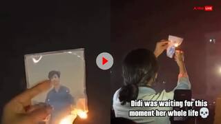 Viral Video: बीच सड़क पर लड़की ने निकाली भड़ास, एक झटके में जला दी बॉयफ्रेंड की तस्वीर, देखें वीडियो