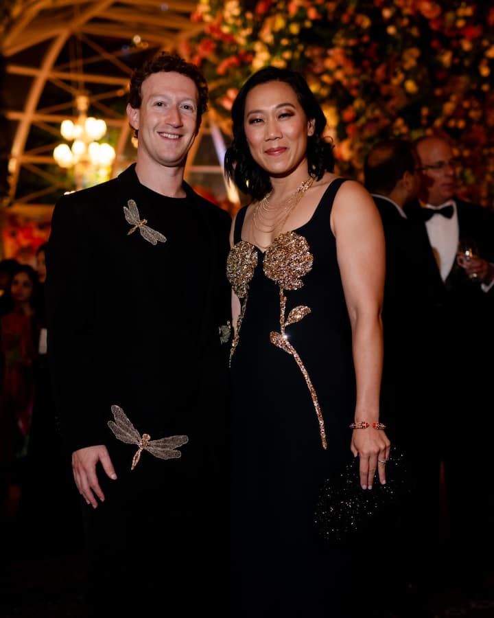 Mark Zuckerberg and Priscilla Chan steal the spotlight at Anant Ambani and Radhika Merchant's pre-wedding festivities in Jamnagar, twinning in all-black outfits adorned with elegant golden details. The Meta CEO and his family exude timeless sophistication in their coordinated ensembles. (Image source: Manav Manglani)