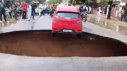 Car Almost Falls Into Giant Crater After Lucknow Road Caves In Watch Video: லக்னோவில் சாலையில் திடீரென விழுந்த பள்ளம் - சிக்கிய கார் - வீடியோ!