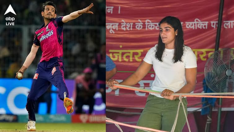 Yuzvendra Chahal gets lifted by wrestler Sangeeta Phogat who spins him around on her shoulders Watch: যুজবেন্দ্র চাহালকে কাঁধে তুলে নিয়ে বনবন ঘোরাচ্ছেন মহিলা পালোয়ান, দেখুন ভিডিও