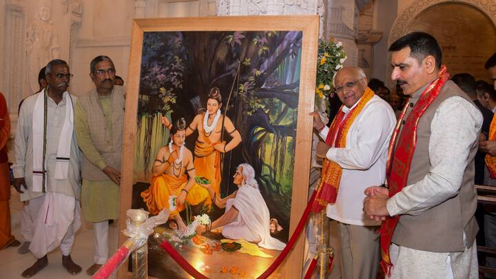 Bhupendra Patel being presented a portrait as a memento during his visit to the Ram temple on Saturday. (Image Source: PTI)