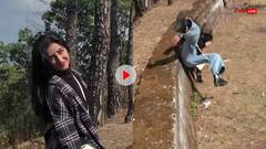 Viral Video: सावधानी हटी, दुर्घटना घटी! रील बनाने के लिए पोज दे रही थी लड़की, अचानक फिसला पैर और...