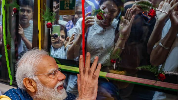 He was also seen waving at his supporters from inside the metro while they clicked his pictures from outside. (Source: PTI)