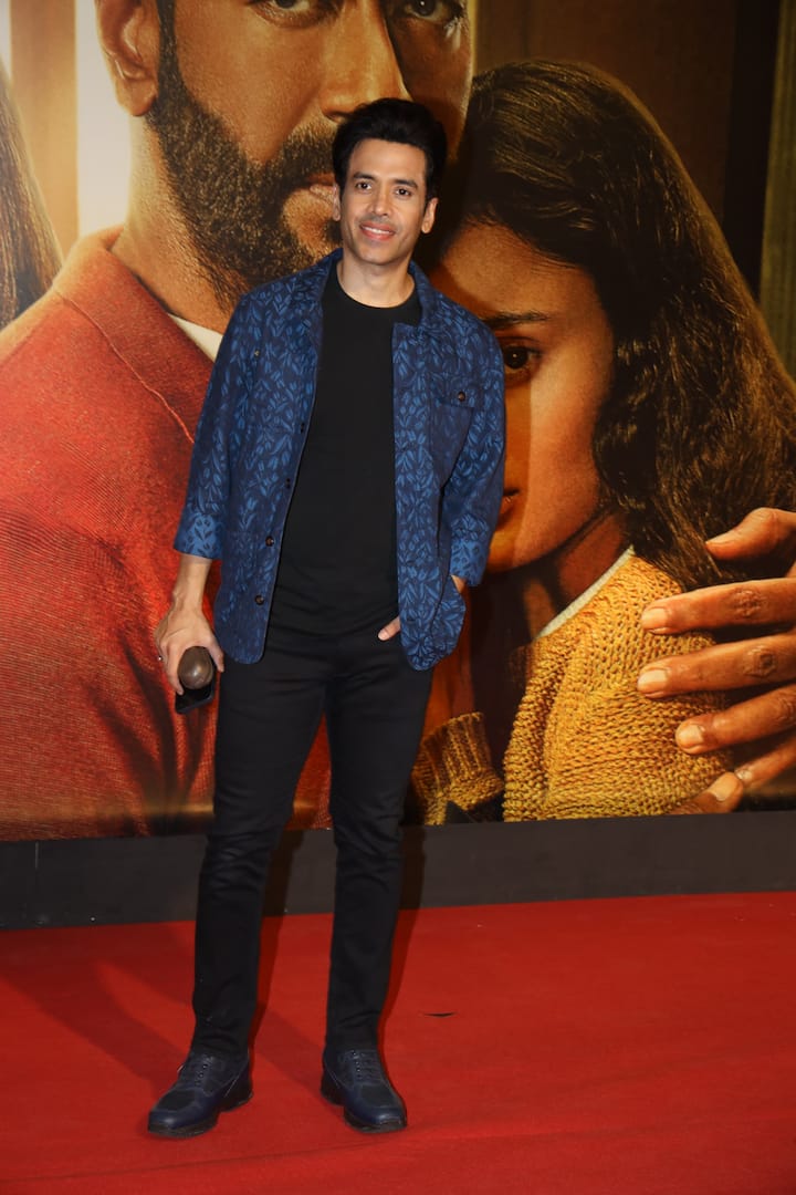 Tusshar Kapoor poses for the paps as he arrives for the screening.