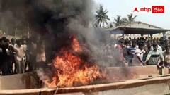 బోట్లకు నిప్పంటించి మరీ మత్స్యకారుల నిరసన - కాకినాడలో ఉద్రిక్తత