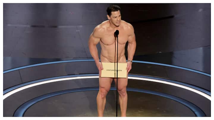 Oscars 2024: Video Of John Cena Turning Up Naked To Present Best Costume Design Award To Poor Things. Host Jimmy Kimmel Oscars 2024: John Cena Turns Up Naked To Present Best Costume Design Award. Watch Video