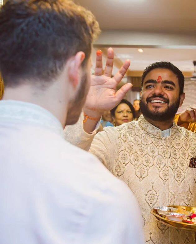 Another photo features Priyanka's brother Siddharth welcoming the couple to the house with the traditional teeka.