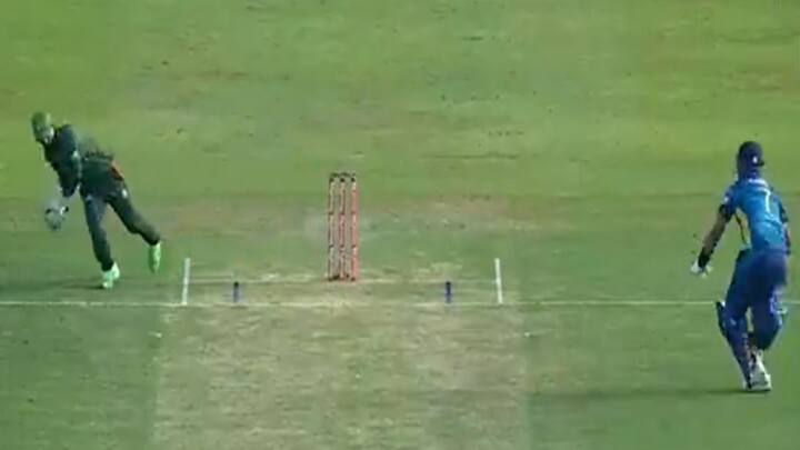 bangladesh wicket keeper Litton Das Affects No-Look Run Out In BAN vs SL 3rd T20I To Dismiss Dasun Shanaka- Watch Video Watch Video: தோனியின் ஸ்டைலில் லிட்டன் தாஸ் செய்த ரன் அவுட்.. இணையத்தில் வைரலாகும் வீடியோ!