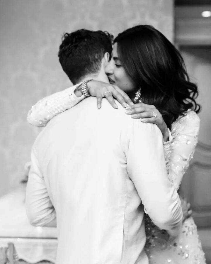 Another photo shows Nick hugging Priyanka, who reciprocated with a kiss on his neck.
