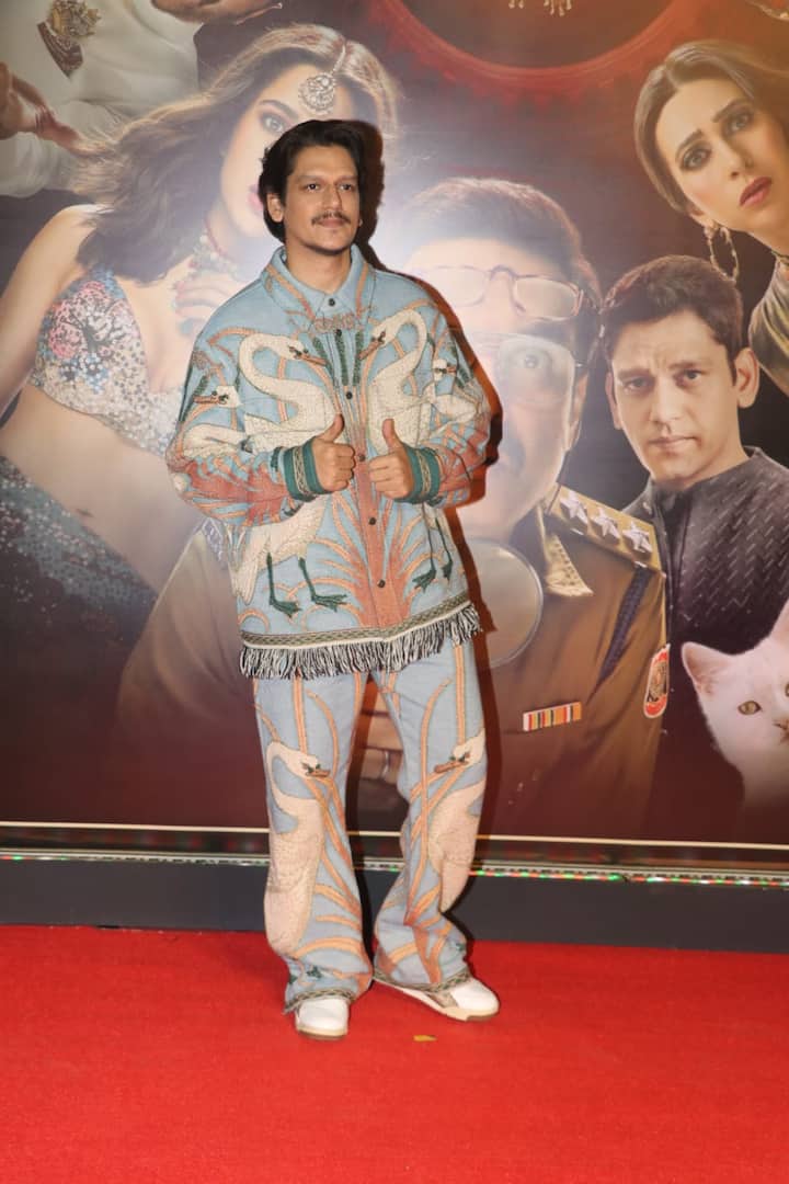 Vijay Varma posed for the paparazzi as he arrived for the screening.