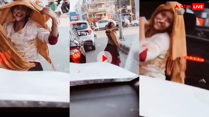 traffic signal girl recorded video on haryanvi song goes viral on social media trending Video: हरियाणवी गाने पर ट्रैफिक सिग्नल पर खड़ी लड़की का डांस हो रहा वायरल, लोग बोले- 'स्ट्रीट क्वीन'