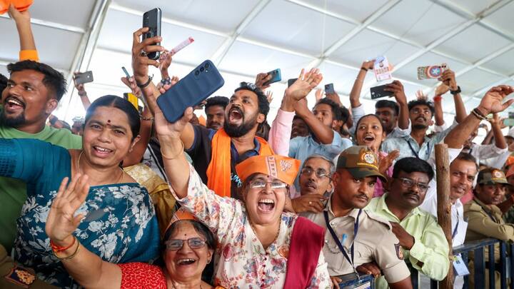 People attend Prime Minister Narendra Modi's rally ahead of Lok Sabha elections, in Shivamogga(Image source: PTI)