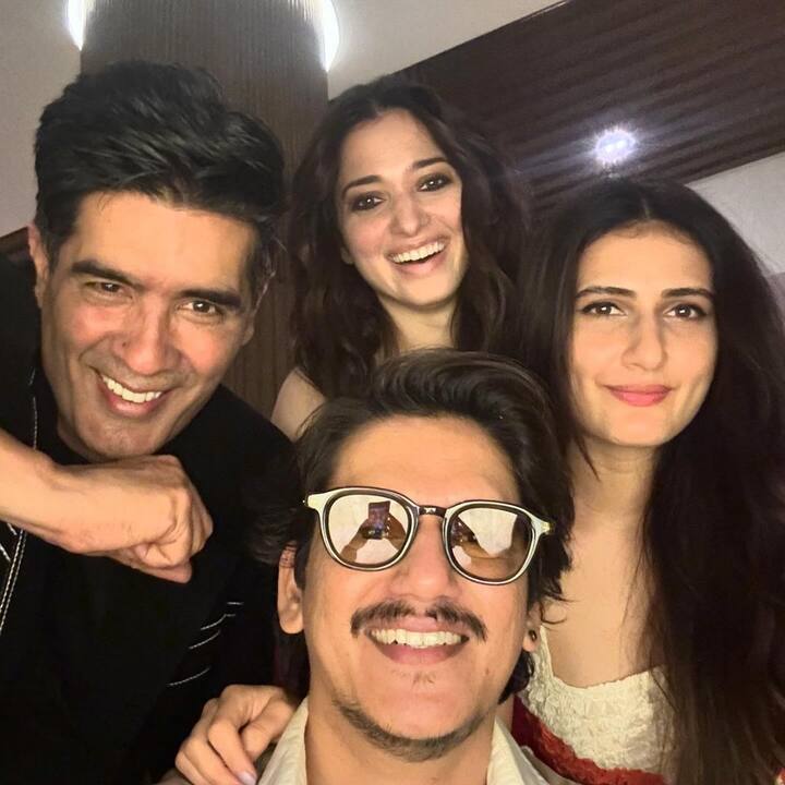 Manish Malhotra poses for a selfie with Vijay, Tamannaah and Fatima.
