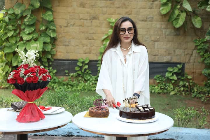 Pictures of actress Rani Mukherjee celebrating her 46th birthday with the paparazzi have already surfaced on social media.  For the special day, the actress wore a white dress and kept her hair open.