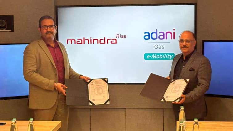 Mahindra Signs MoU With Adani Total Energies E-Mobility For EV Charging Infra Access Mahindra Signs MoU With Adani Total Energies E-Mobility For EV Charging Infra Access