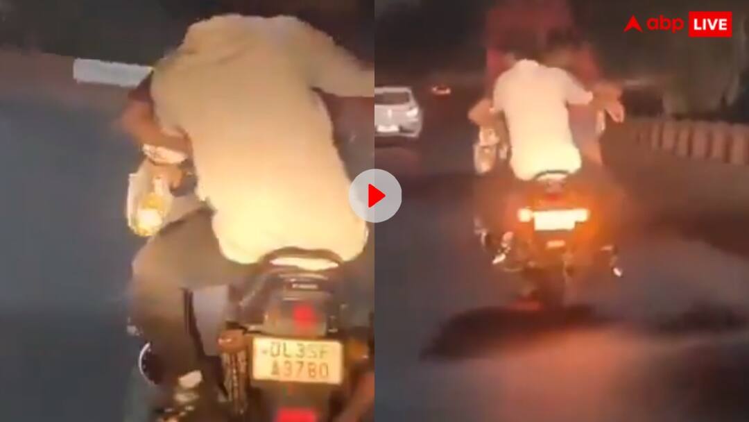 Video: हाथ में शराब और चाकू लिए दिल्ली की सड़कों पर बेखौफ घूमते दिखे बदमाश...कोई रोकने वाला नहीं? Three bike riders can be seen roaming fearlessly on the streets of Delhi holding knives and liquor in their hands Video: हाथ में शराब और चाकू लिए दिल्ली की सड़कों पर बेखौफ घूमते दिखे बदमाश...कोई रोकने वाला नहीं?