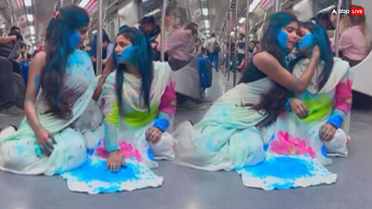 Two Girls Holi Celebration Inside Moving Metro Train Video Goes Viral Internet Users Slam This Metro Holi Viral Video: 'देखने में ही शर्म आ रही', मेट्रो में होली खेलने वाली लड़कियों पर भड़के यूजर्स