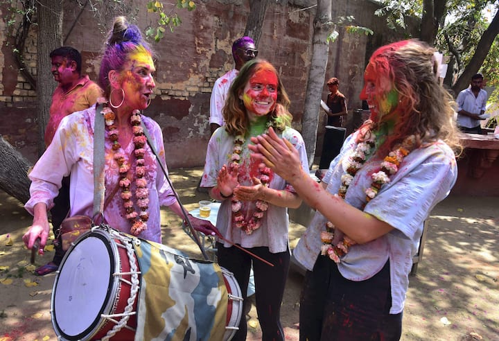 Bikaner: Foreign nationals during Holi celebrations, in Bikaner, Monday, March 25, 2024. (Image source: PTI Images)