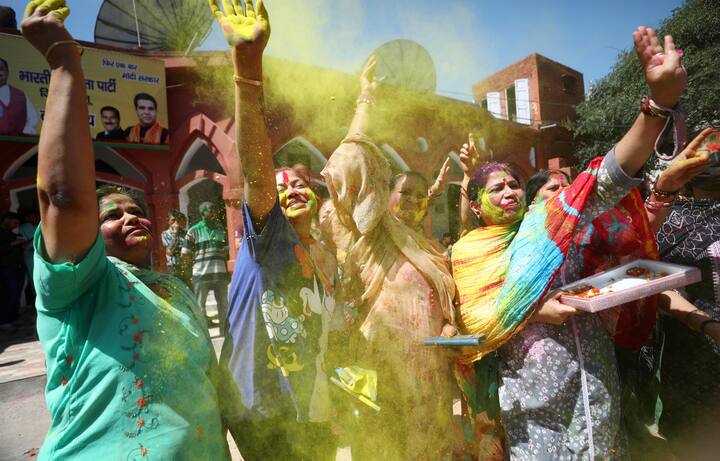 Jammu: BJP Mahila Morcha workers play with colours during Holi celebrations, in Jammu, Monday, March 25, 2024.  (Image source: PTI Images)