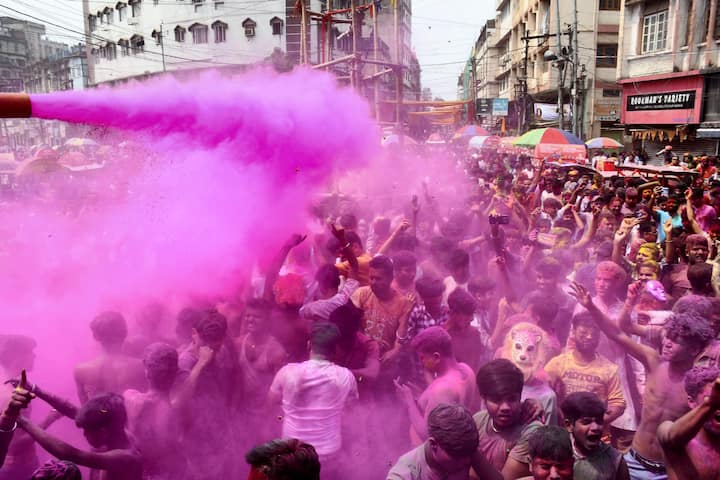 Guwahati: People play with colours during Holi celebrations, in Guwahati, Monday, March 25, 2024. (Image source: PTI Images)