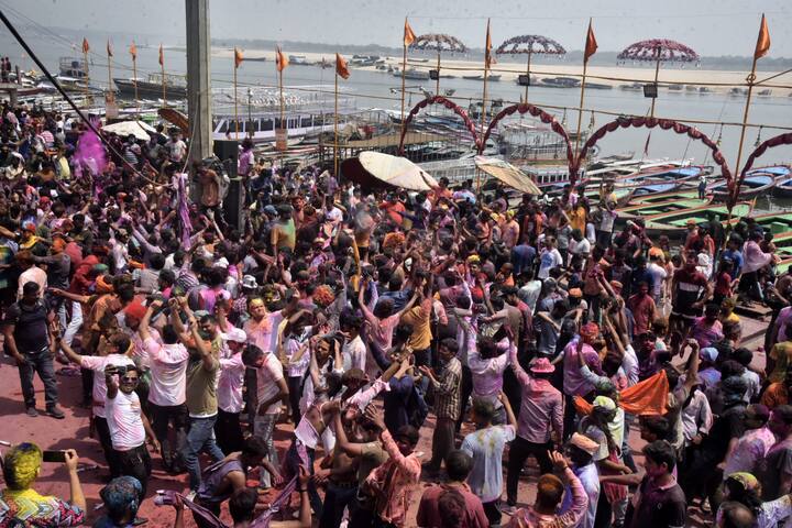 Varanasi: People play with colours on the occasion of Holi festival, in Varanasi, Monday, March 25, 2024. (Image source: PTI images)