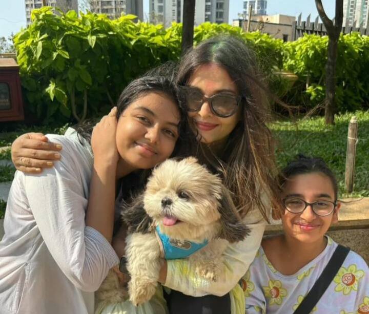 The couple, accompanied by their daughter Aaradhya, was captured in photos of Holi. (Image: X/@rai_ps2)