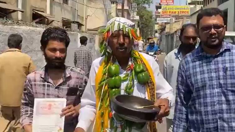 Lok Sabha Election 2024 Independent candidate Coimbatore Constituency Noor Mohammed file nomination with garland made of chillie capsicums Lok Sabha Elections 2024: अन्नामलाई के खिलाफ मिर्ची की माला पहन क्यों नामांकन दाखिल करने पहुंचे नूर मोहम्मद? जानें