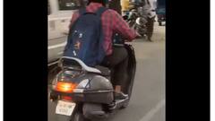 பைக் ஓட்டிக்கொண்டே லேப்டாப்பில் மீட்டிங் அட்டன் செய்த நபர் - நீங்களே பாருங்க