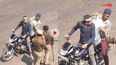 तपती धूप में तैनात थे पुलिसवाले, दो मुस्लिम लड़कों ने पिलाया पानी, लोगों का दिल जीत रहा ये Video