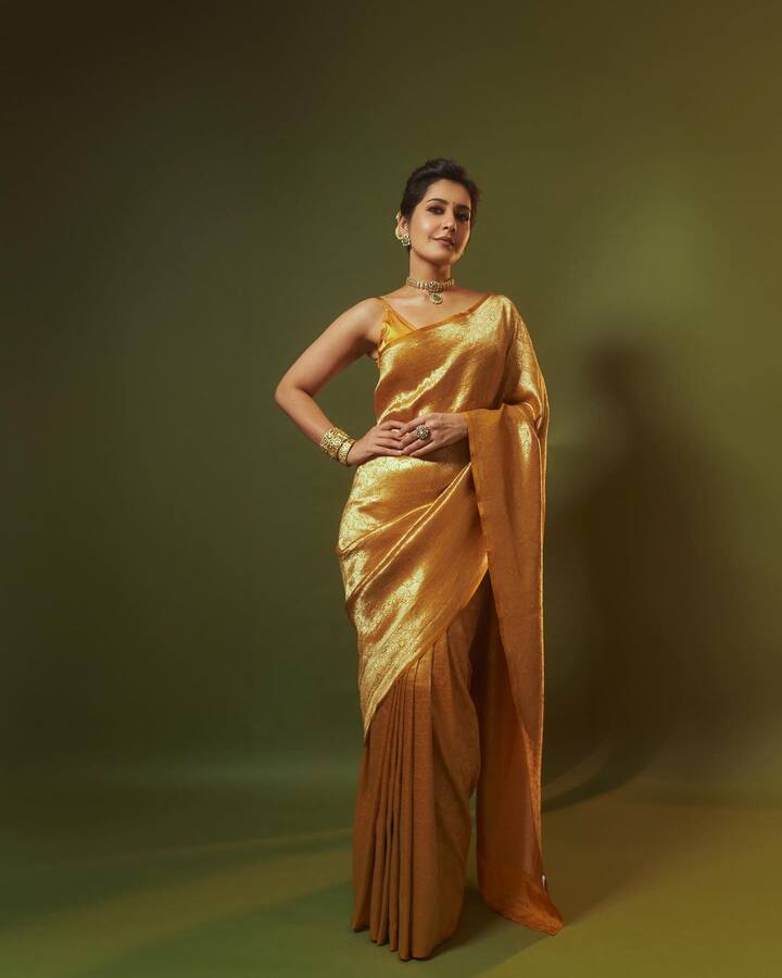 Her golden saree came from a clothing brand Sacred Weaves.