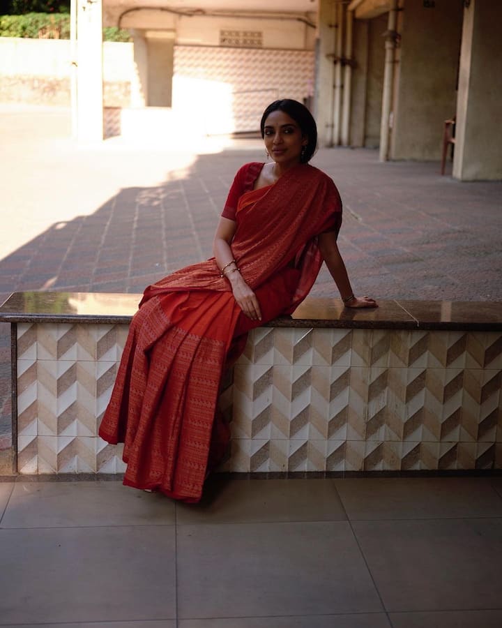 Sobhita uploaded pictures on Instagram wearing a red and orange cotton saree.