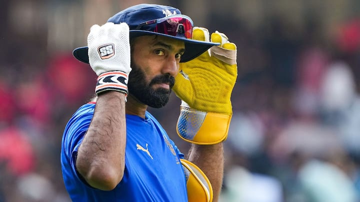 3) Dinesh Karthik - 274 dismissals: Known for his agility and safe pair of hands, Dinesh Karthik holds the third position with 274 dismissals, consisting of 207 catches and 67 stumpings, in the comprehensive list of T20 dismissals by wicket-keepers. (Image Source: PTI)